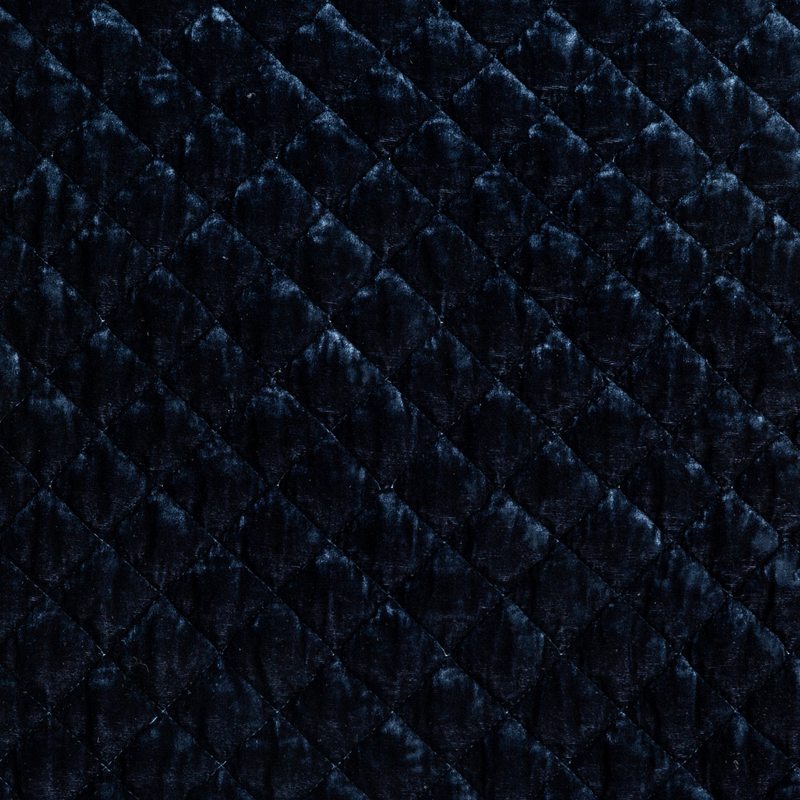 Silk Velvet Quilted Twin Coverlet | Midnight | A close up of quilted silk velvet fabric in midnight, a rich indigo tone.
