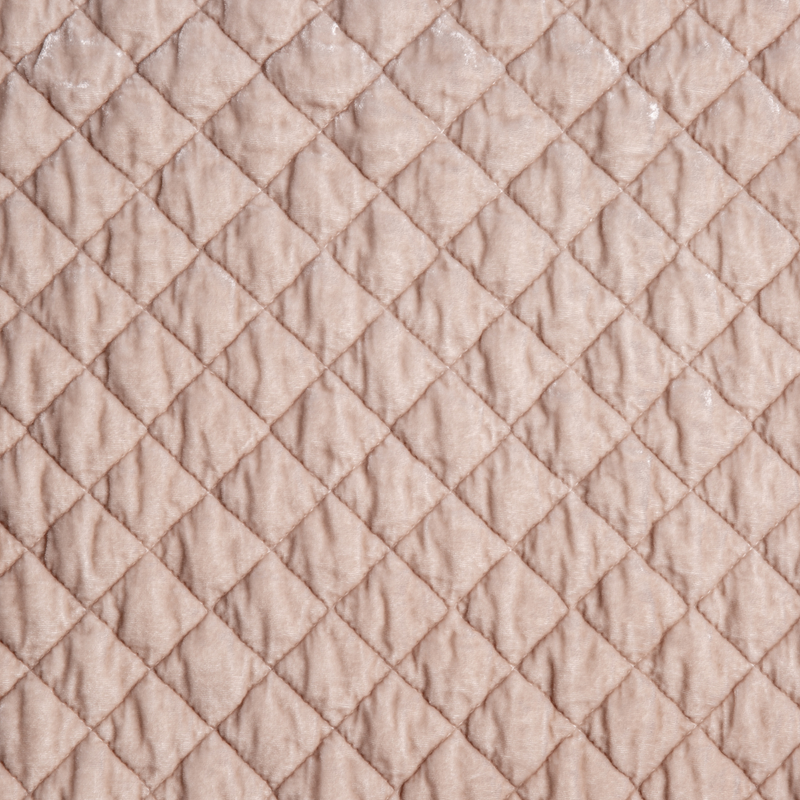 Silk Velvet Quilted Baby Blanket | Pearl | A close up of quilted silk velvet fabric in pearl, a nude-like, soft rose pink tone.
