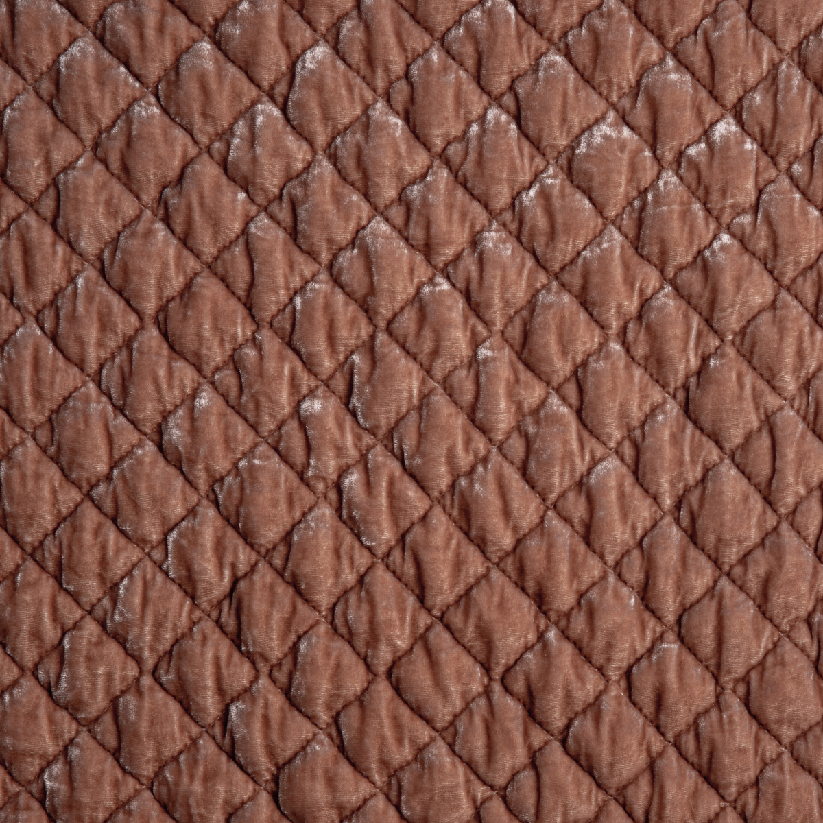 Silk Velvet Quilted Coverlet | Rouge | A close up of quilted silk velvet fabric in rouge, a mid-tone blush pink.