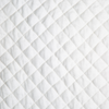 Silk Velvet Quilted Swatch | Winter White | A close up of quilted silk velvet fabric in winter white, softer and warmer in tone than classic white.