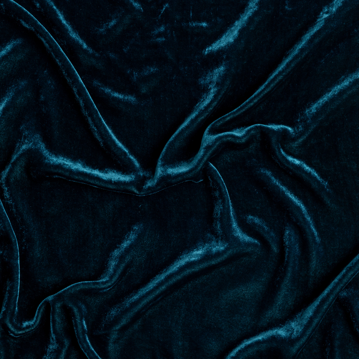 Carmen Blanket | Cenote | A close up of silk velvet fabric in cenote, a vibrant, ocean-inspired blue-green.