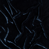 Carmen Blanket | Midnight | A close up of silk velvet fabric in midnight, a rich indigo tone.