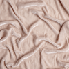 Silk Velvet Swatch | Pearl | A close up of silk velvet fabric in pearl, a nude-like, soft rose pink tone.