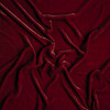 Silk Velvet Swatch | Poppy | A close up of silk velvet fabric in poppy, a warm coral pink.