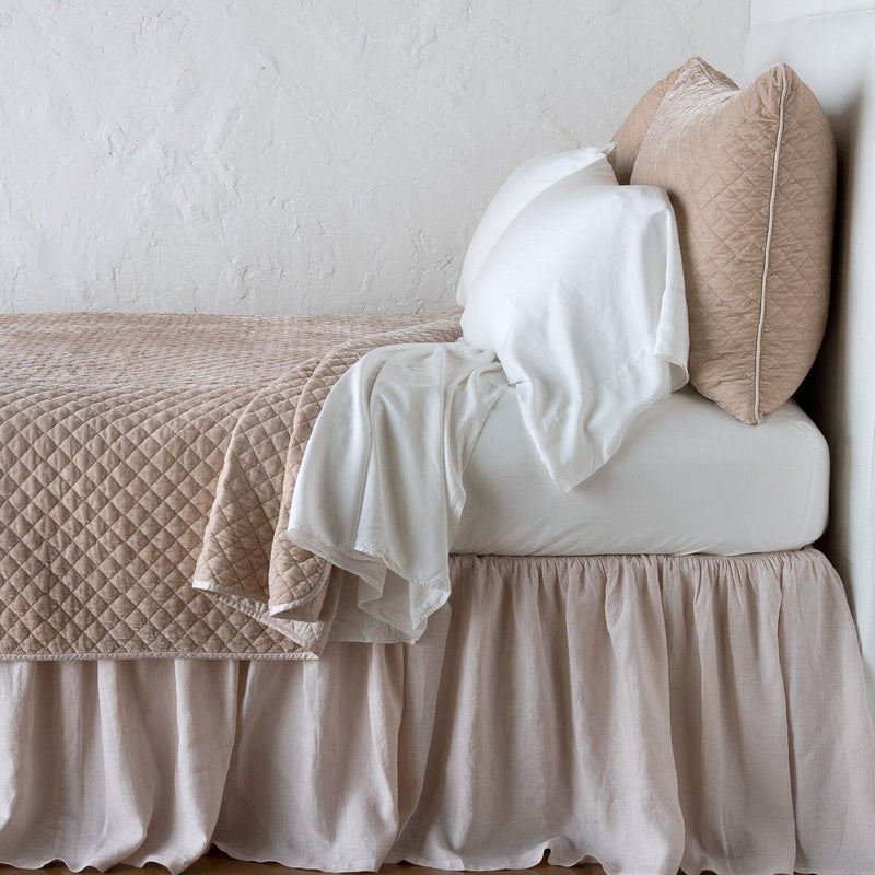 Silk Velvet Quilted Twin Coverlet | Pearl | Silk velvet quilted coverlet with matching shams and white sheeting - pearl, side view.