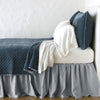 Silk velvet quilted shams with matching coverlet and white sheeting - mineral, side view.