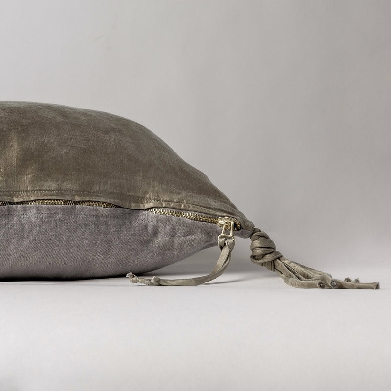 Taline Throw Pillow | Moonlight | Close-up side vew featuring brass zipper with charmeuse pull and linen back.