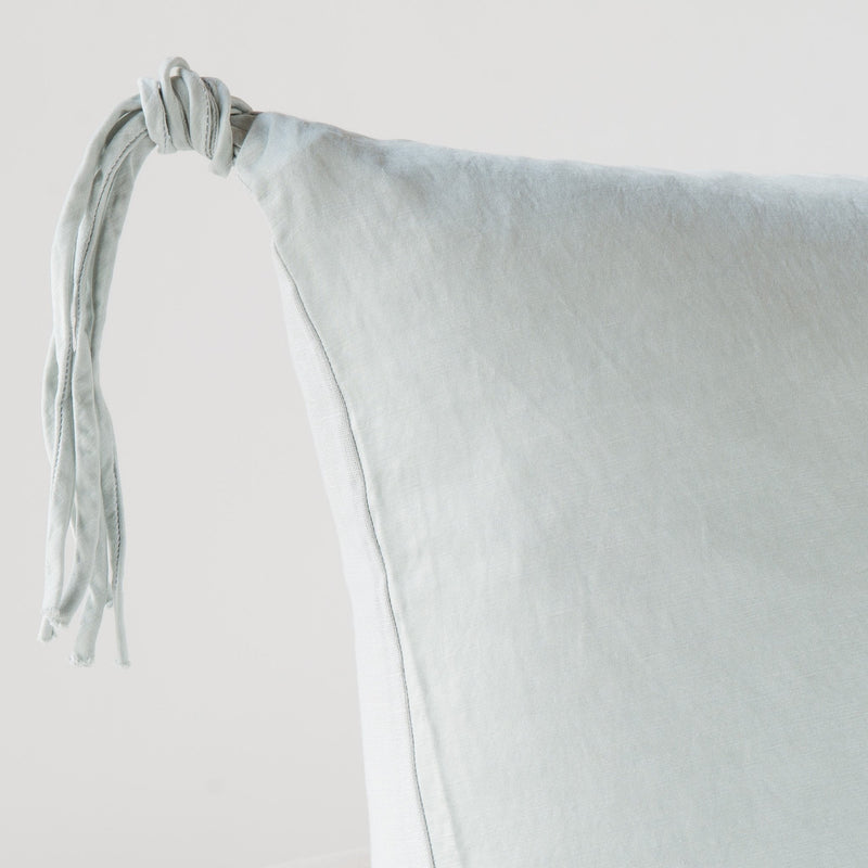 Taline Sham | Cloud | Corner detail close-up, highlighting hand-tied charmeuse tassel.