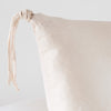 Taline Sham | Pearl | Corner detail close-up, highlighting hand-tied charmeuse tassel.