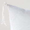 Taline Sham | White | Corner detail close-up, highlighting hand-tied charmeuse tassel.