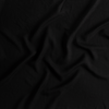 Tencel™ Swatch | Corvino | A close up of tencel™ fabric in Corvino, a black tone.