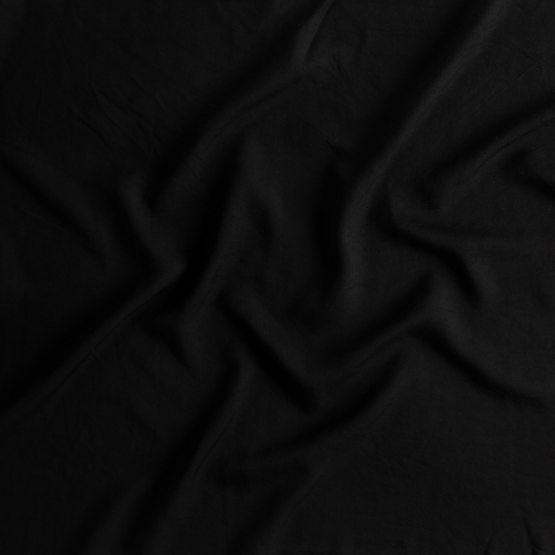 Madera Luxe Pillowcase (Single) | Corvino | A close up of tencel™ fabric in Corvino, a black tone.