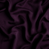 Tencel ™ Yardage | Fig | A close up of tencel™ fabric in fig, a richly saturated purple-garnet.