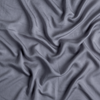 Madera Luxe Twin Duvet Cover | French Lavender | a close up of tencel™ fabric in french lavender, a neutral violet tone.