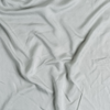 Madera Luxe Standard Pillowcase (Single) | Mineral | A close up of tencel™ fabric in mineral, a soothing seafoam blue with subtle grey-green undertones.