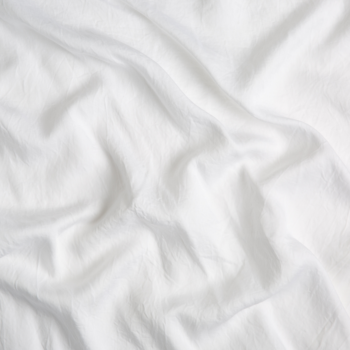 Tencel™ Swatch Card | White | A close up of tencel™ fabric in classic white.