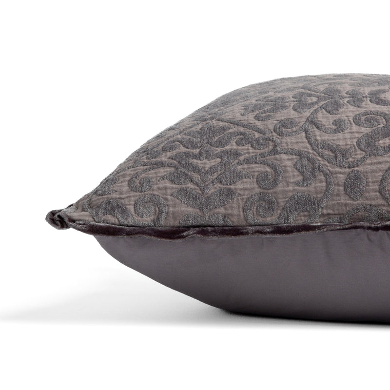 Vienna Throw Pillow | side view of 18x18 pillow shows cotton sateen back and silk velvet trim detail — close up against a white background. 