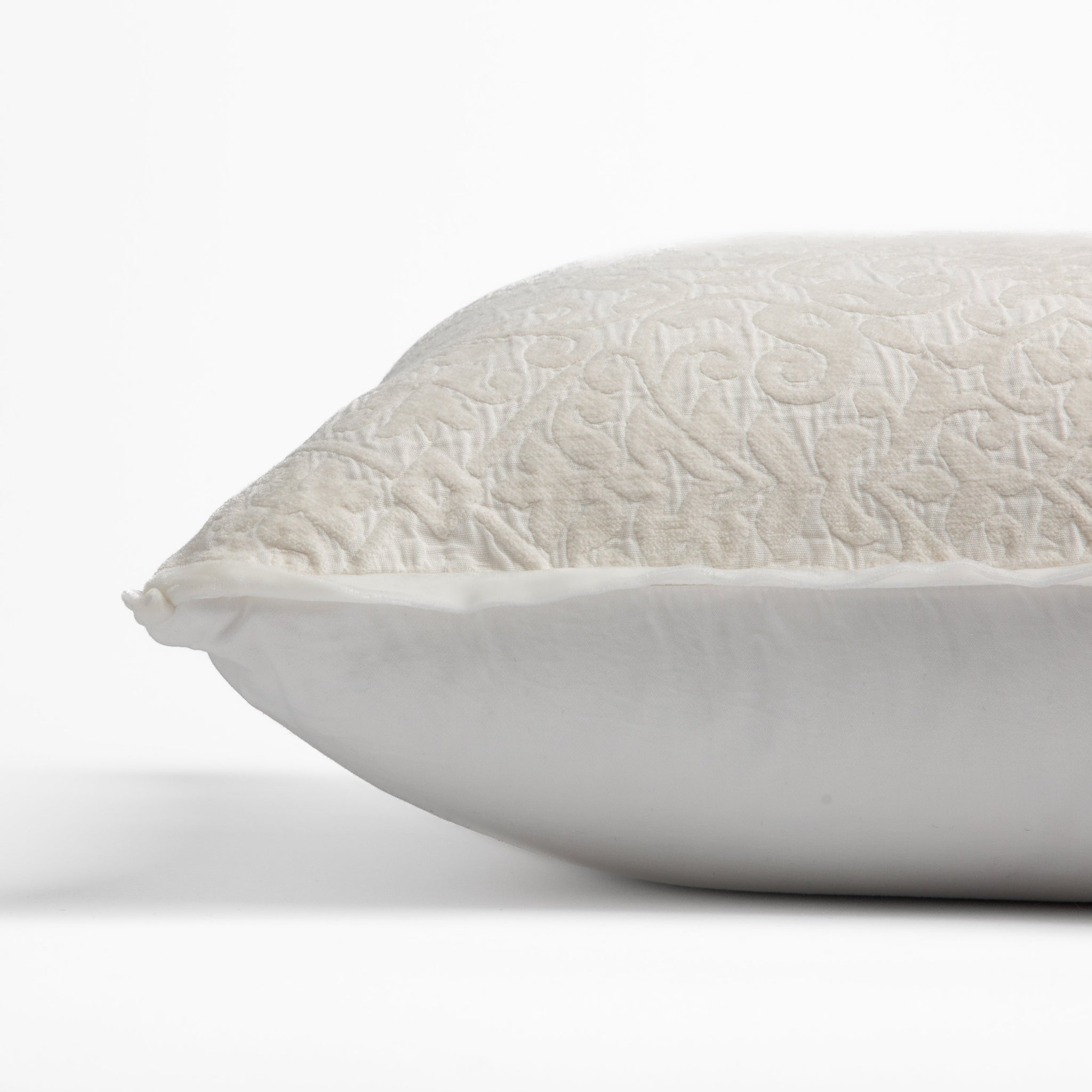 Vienna Throw Pillow | side view of 18x18 pillow shows cotton sateen back and silk velvet trim detail — close up against a white background.