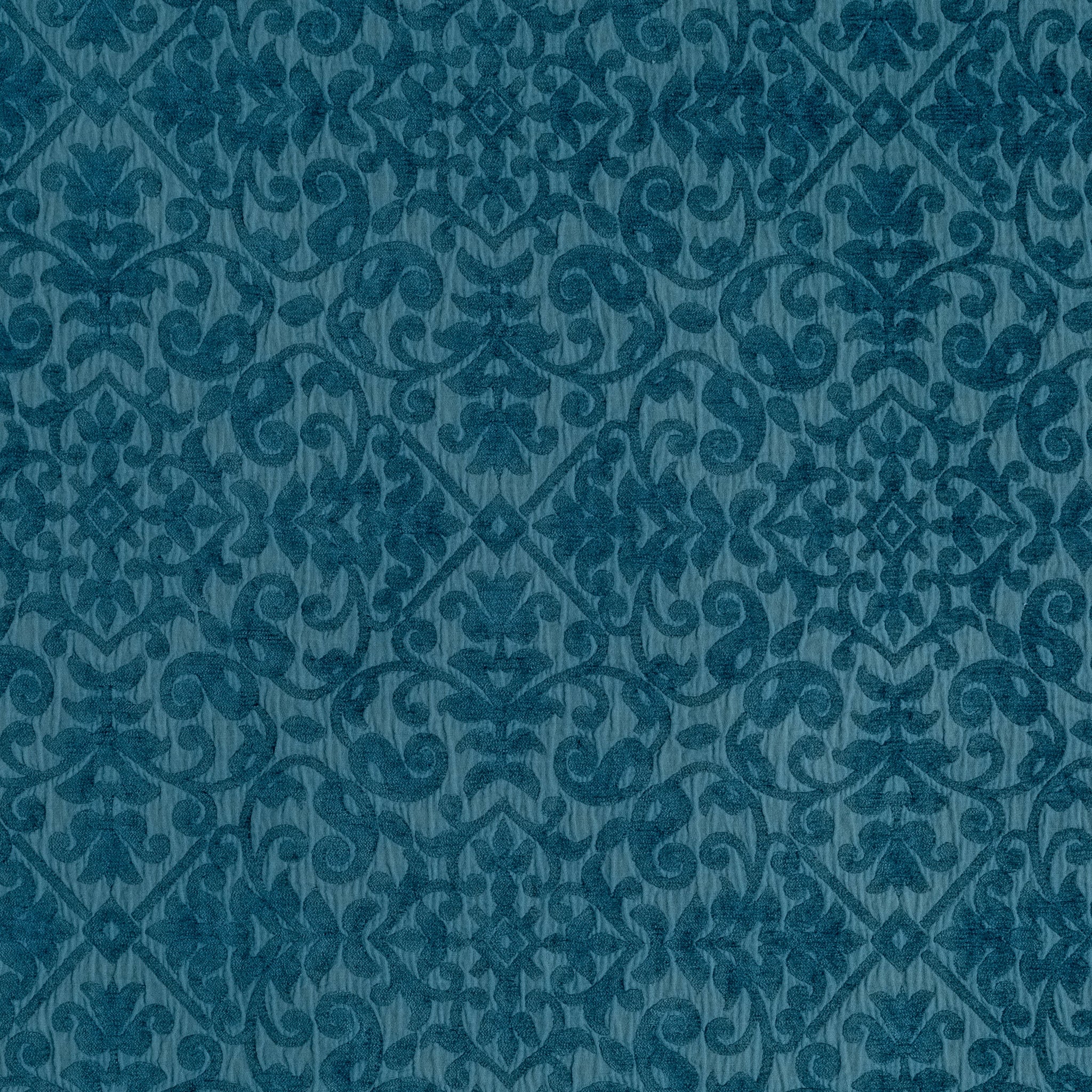 Vienna Baby Blanket | Cenote | A close up of cotton chenille fabric in cenote, a vibrant, ocean-inspired blue-green.