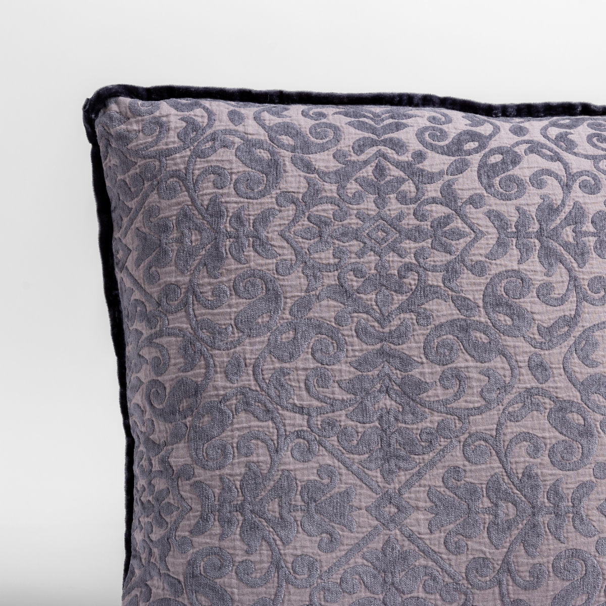 French Lavender | a close up of a vienna throw pillow corner, showing trim and pattern detail — straight on against a white background.