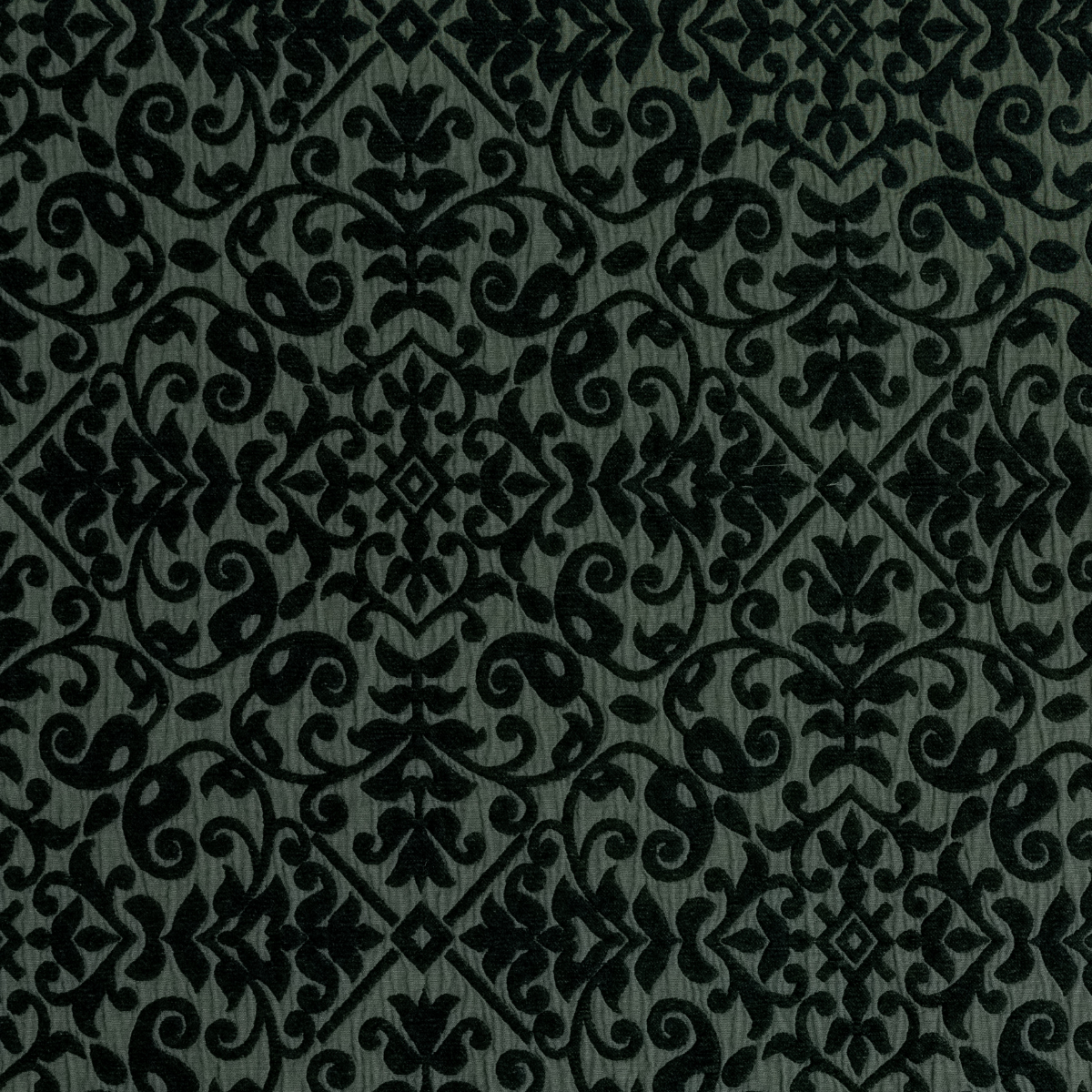 Vienna Coverlet | Juniper | A close up of cotton chenille fabric in Juniper, a deep green tone.