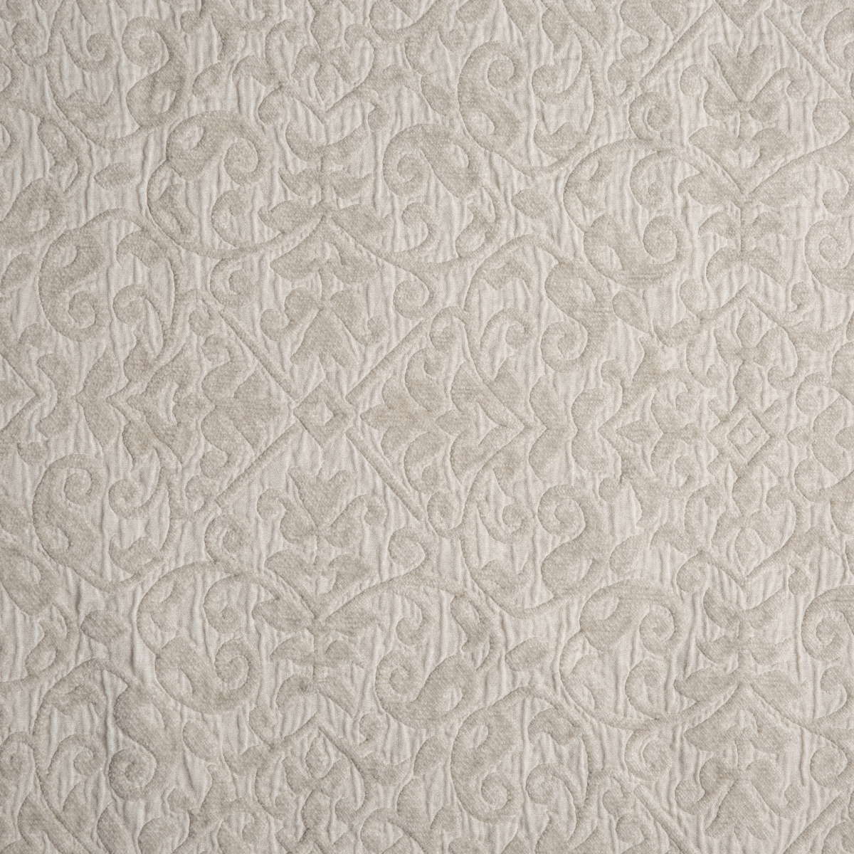 Vienna Coverlet | Parchment | A close up of cotton chenille fabric in parchment, a warm, antiqued cream.