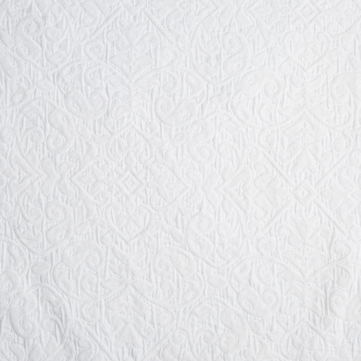 Vienna Coverlet | White | A close up of cotton chenille fabric in classic white.