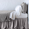 Vienna Twin Coverlet | Fog | Cotton chenille jacquard coverlet and matching sham over white sheeting - side view.
