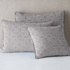 Vienna Sham | Fog | Cotton chenille jacquard shams leaning upright against a neutral headboard.