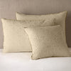 Vienna Sham | Honeycomb | Cotton chenille jacquard shams leaning upright against a neutral headboard.